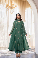 Style this stunning traditional ensemble with heels and statement earrings for elegance.