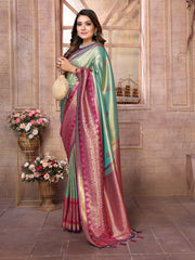 Woman wearing a traditional saree with a floral background