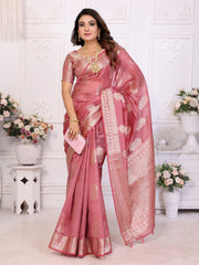 Woman wearing a pink saree with a white background