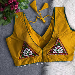 Yellow blouse with floral embroidery