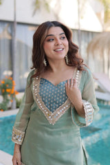 Woman in a traditional outfit with a blurred background