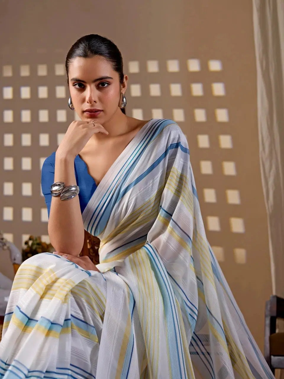 White Stripe Premium Monsoon Saree – seated close-up with Royal Blue blouse