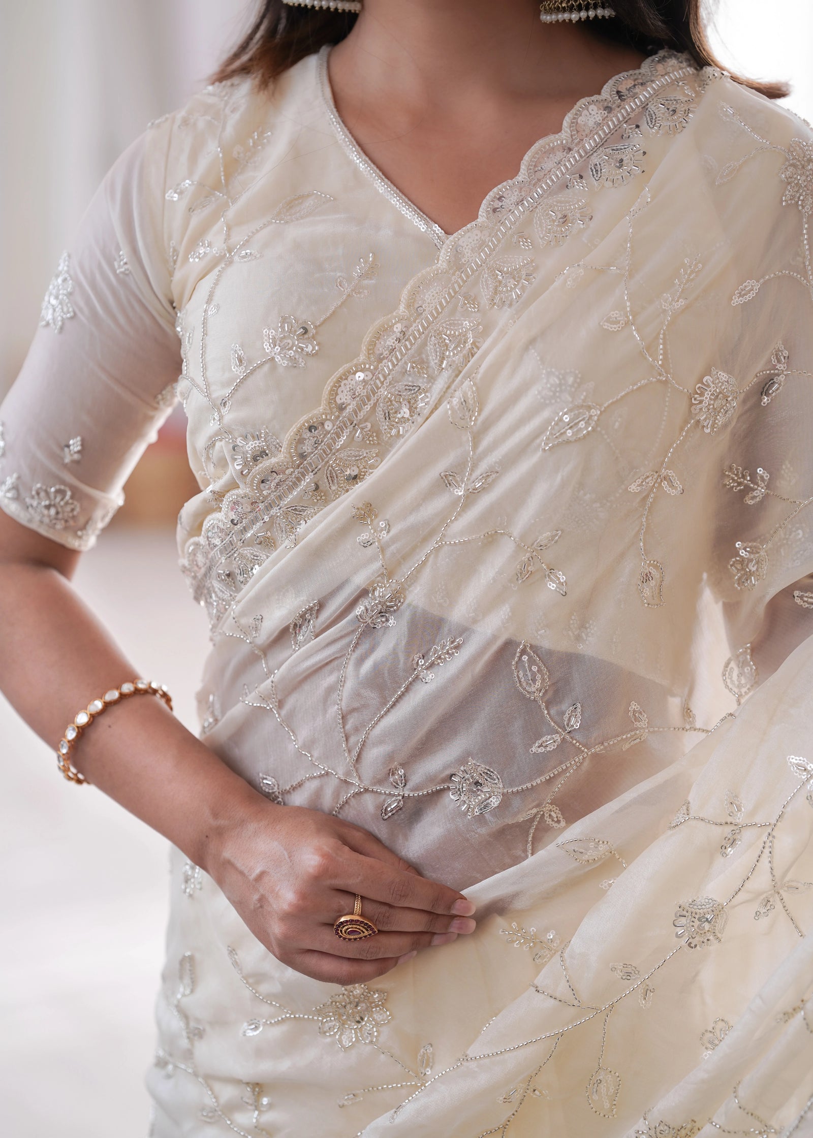 White Designer Fendy Silk Saree with Beads Detailing and C Style Pallu