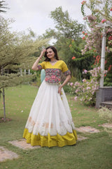 Traditional White and Yellow Lehenga Choli with Colorful Mirror Style Embroidery and Festive Appeal