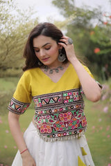 Premium Ivory White and Mustard Yellow Lehenga Choli with Designer Embroidered Top, Lotus Border Motifs, and Elegant Ethnic Appeal