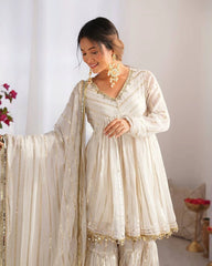 Woman in a traditional outfit with a white background