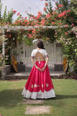 Traditional White and Hot Pink Designer Lehenga Set with Embroidered Blouse, Broad Contrast Border, and Elegant Celebration Wear