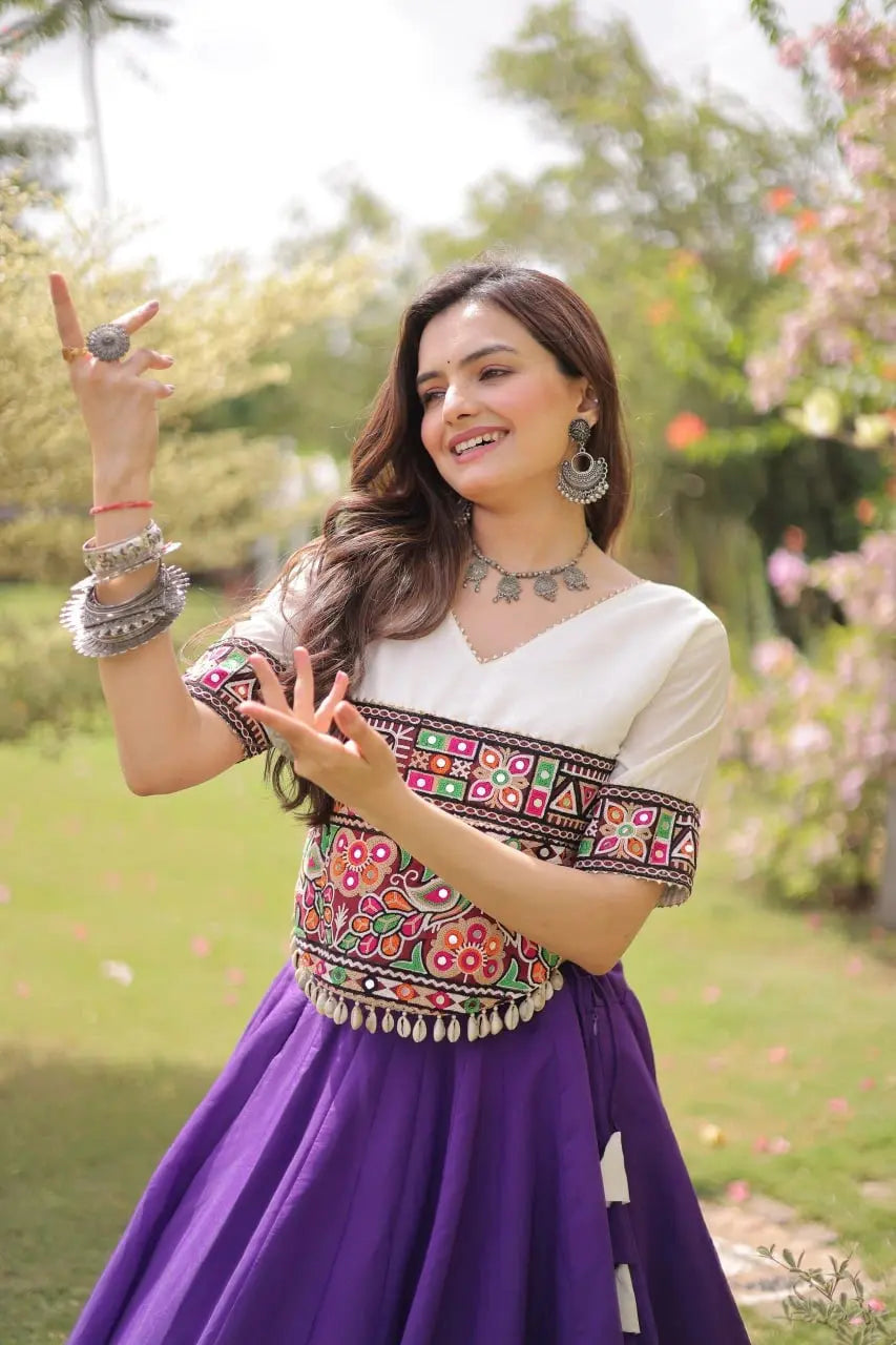Designer Royal Purple Lehenga Set featuring White Embroidered Blouse, Multicolor Artisan Motifs, and Contrast Border