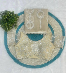 Gorgeous champagne beige sequins embroidered saree with matching blouse blends classic elegance, modern fashion, and festive charm.