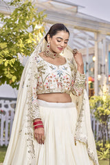 Woman in traditional embroidered outfit with a blurred outdoor background