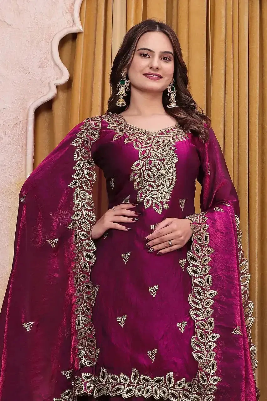 Close-up of embroidery work and dupatta border on Wine Sequins Embroidered Suit