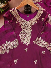 Close-up flat lay of gold sequin embroidery on Wine Sequins Embroidered Suit neckline