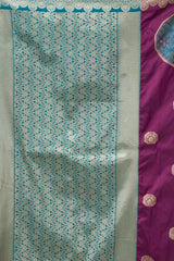 Fabric with a geometric pattern on one side and a solid color with decorative elements on the other, displayed against a white background.