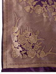 Embroidered fabric with floral patterns on a purple and gold background