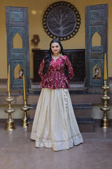 Woman in a red blouse and white skirt standing in a decorated room with wooden panels and candles.