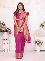 Woman in a pink saree with a white background