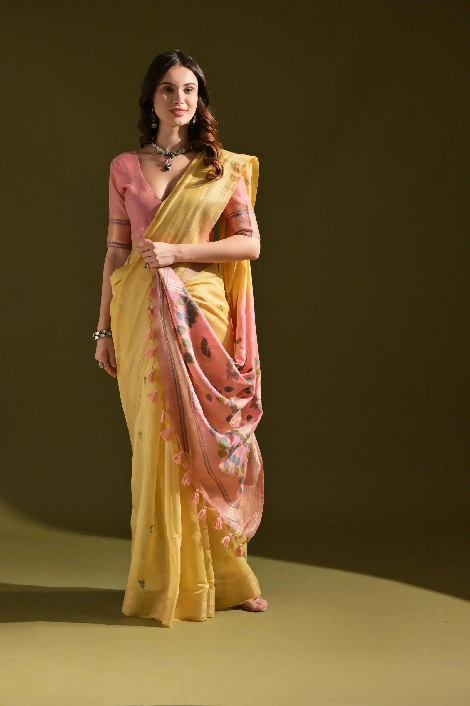 Yellow Resham Weaving Saree styled with contrast pink blouse and jewellery