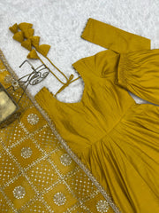 Flat lay close-up of Yellow Anarkali Suit neck and sequins embroidered dupatta