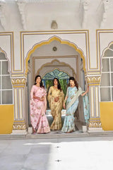 Yellow Thread Embroidered Jacquard Saree in a group walking shot