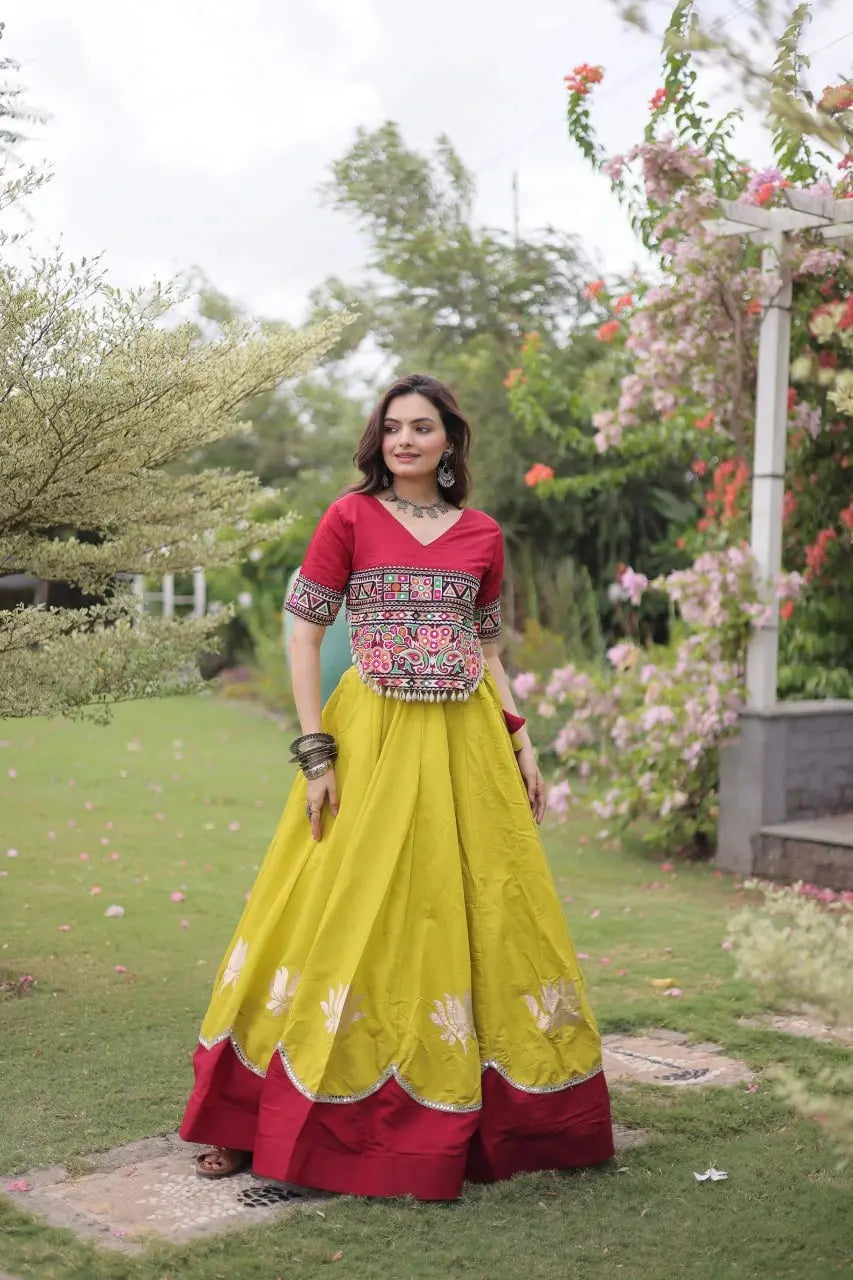 Designer Yellow Lehenga Set featuring Maroon Embroidered Blouse, Multicolor Artisan Motifs, and Contrast Border