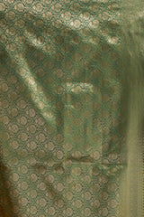 Close-up of green fabric with intricate patterns