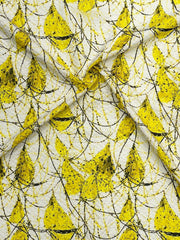Textile with yellow leaf pattern on a white background