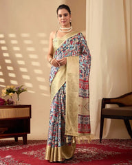 Graceful model showcasing a printed ethnic saree featuring vibrant motifs, a golden pallu, and a matching sleeveless blouse.