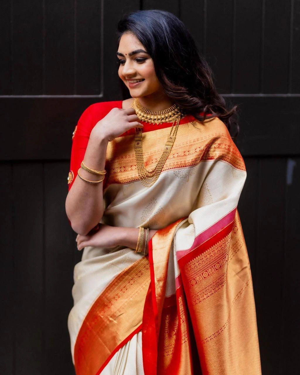 Cream art silk blend saree with red jacquard pallu worn by model – Kalyanja KS409