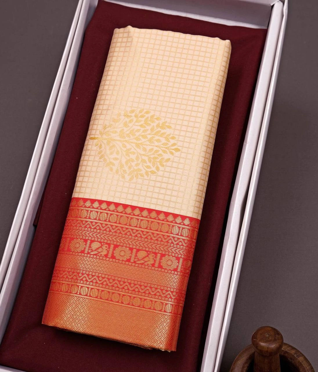 Cream art silk saree in gift box with gold butta and red border – Kalyanja KS409