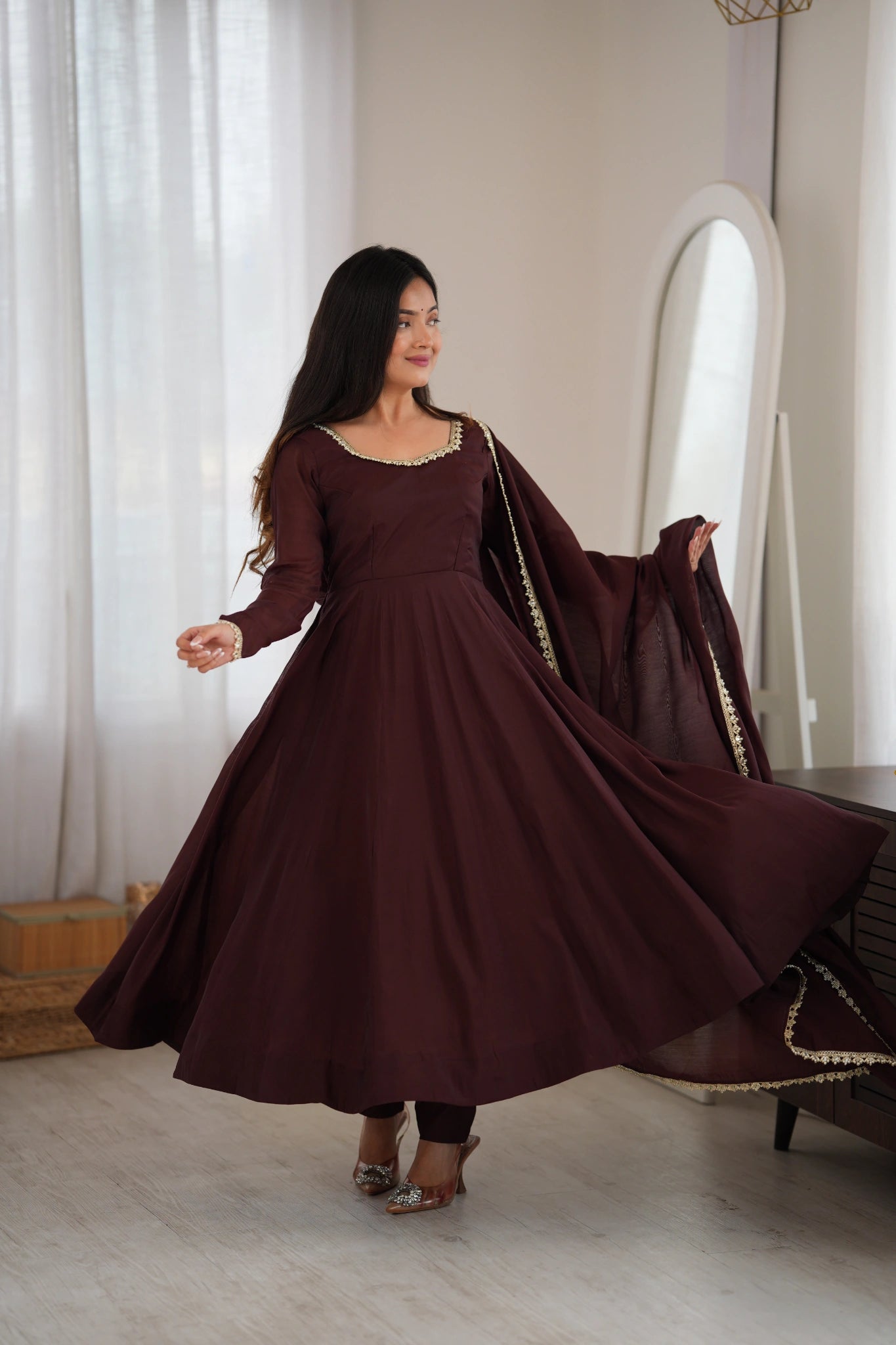 Dark Brown Handwork Suit in motion with gold lace dupatta border