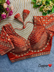 Dark pastel red blouse crafted from soft silk fabric, featuring intricate sequence and codding thread work.