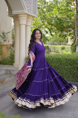 Deep Purple Gota Patti Anarkali Suit side spinning shot showing tiered layers and border