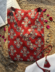 Ruhi short kurti with a traditional rust-red floral print and an adjustable wrap-around silhouette – Kalyanja.