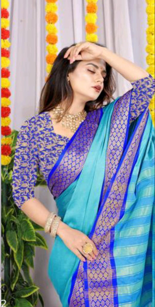 Light beige silk saree with magenta gold zari border paired with maroon brocade designer blouse yellow striped pallu traditional wedding