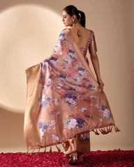 Soft pink lichi silk saree featuring a vibrant floral digital print, an elegant gold zari woven border, and tassel details by Kalyanja.