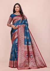 Teal blue Avni silk saree featuring intricate copper-toned zari weaving and a rich maroon pallu by Kalyanja.