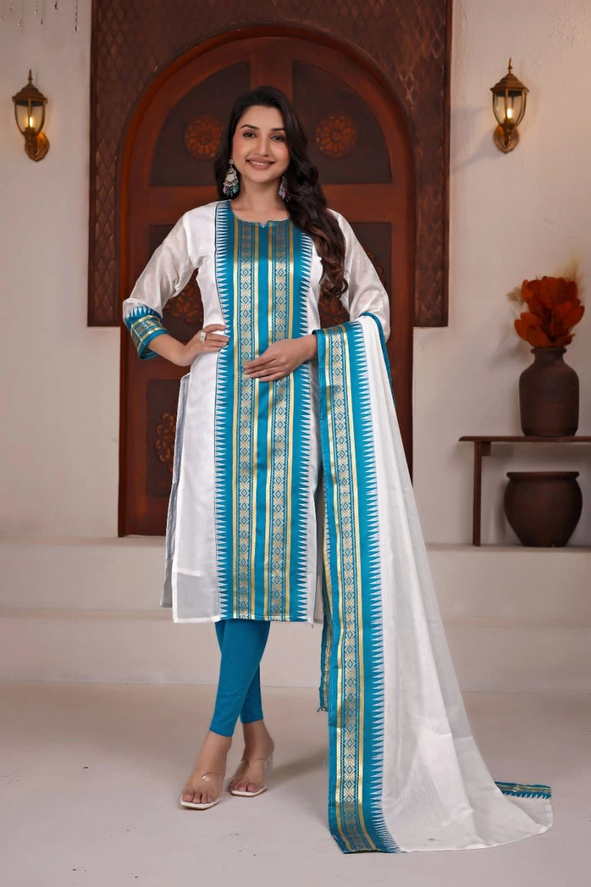Woman wearing a traditional outfit with blue and white stripes in a decorative setting.