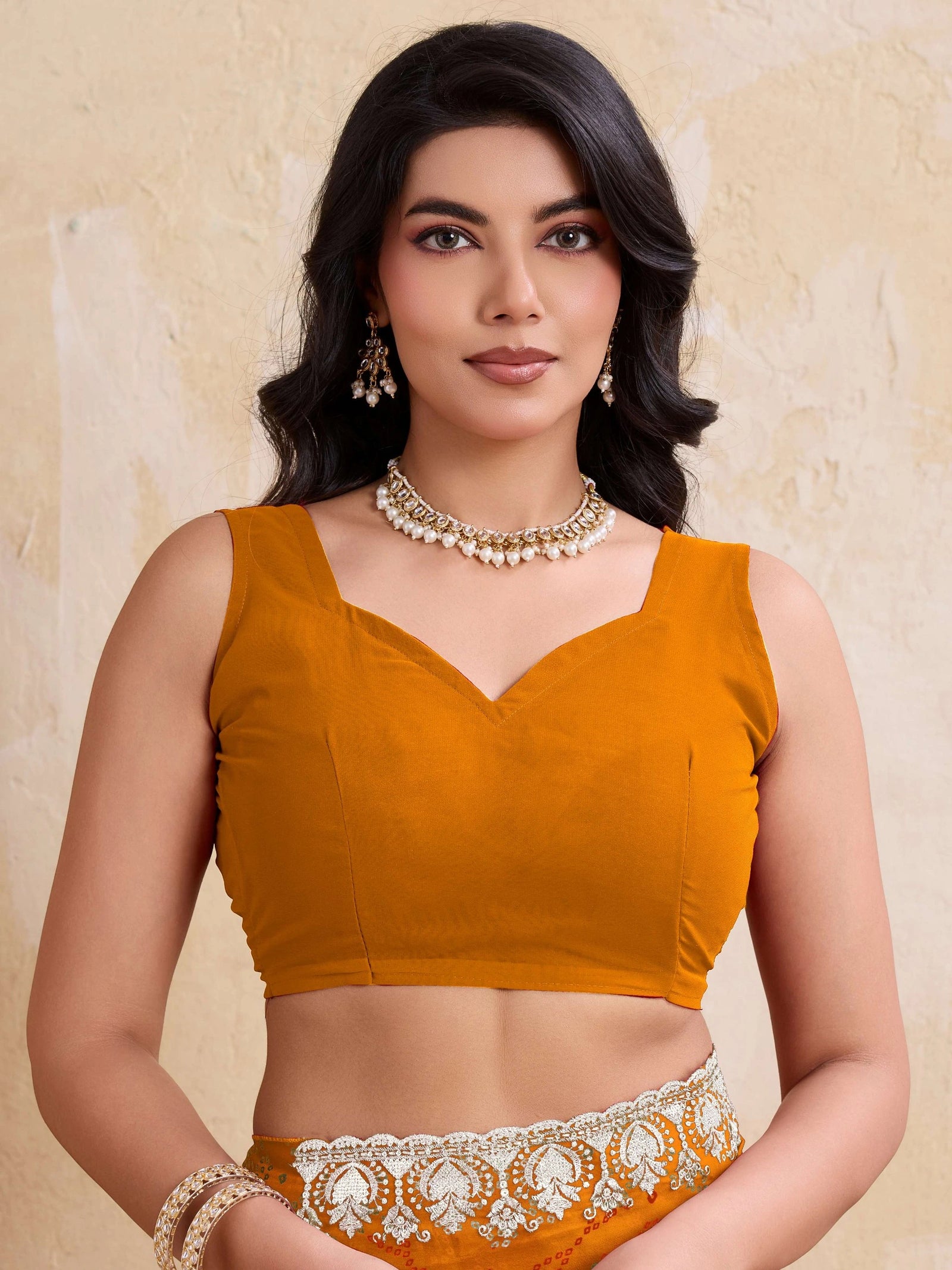 yellow georgette bandhej print saree