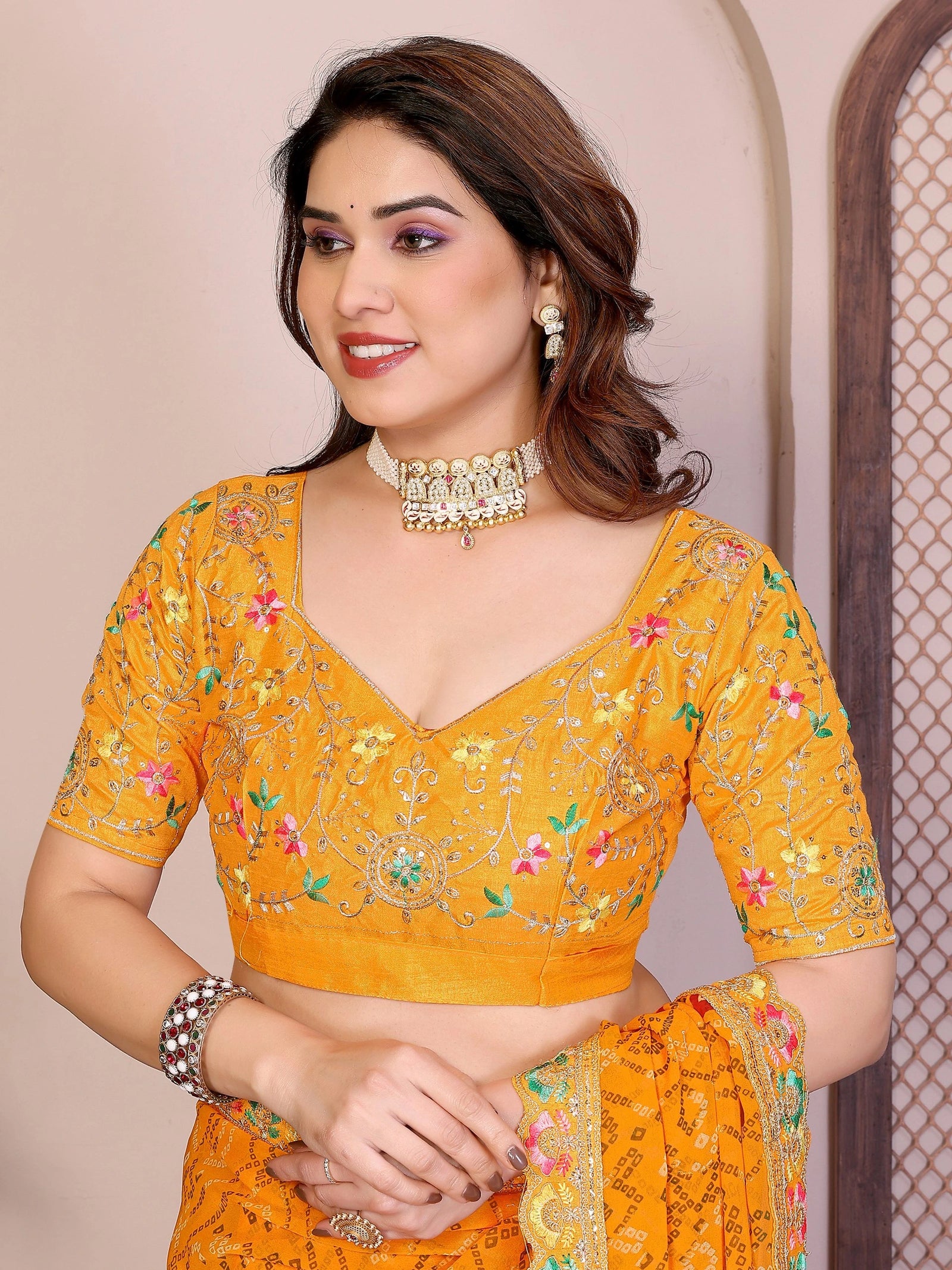 yellow bandhej print georgette saree