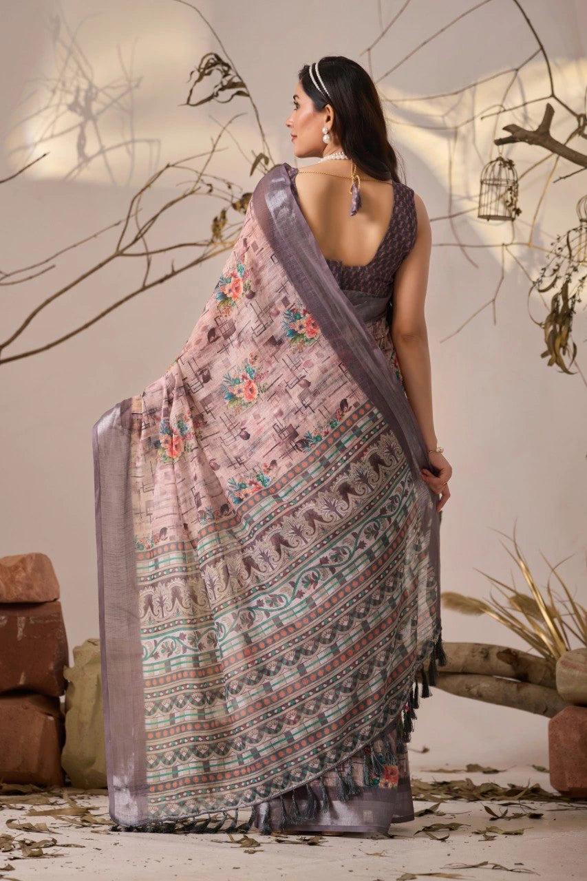 Woman wearing a traditional saree with intricate patterns in a decorative setting.