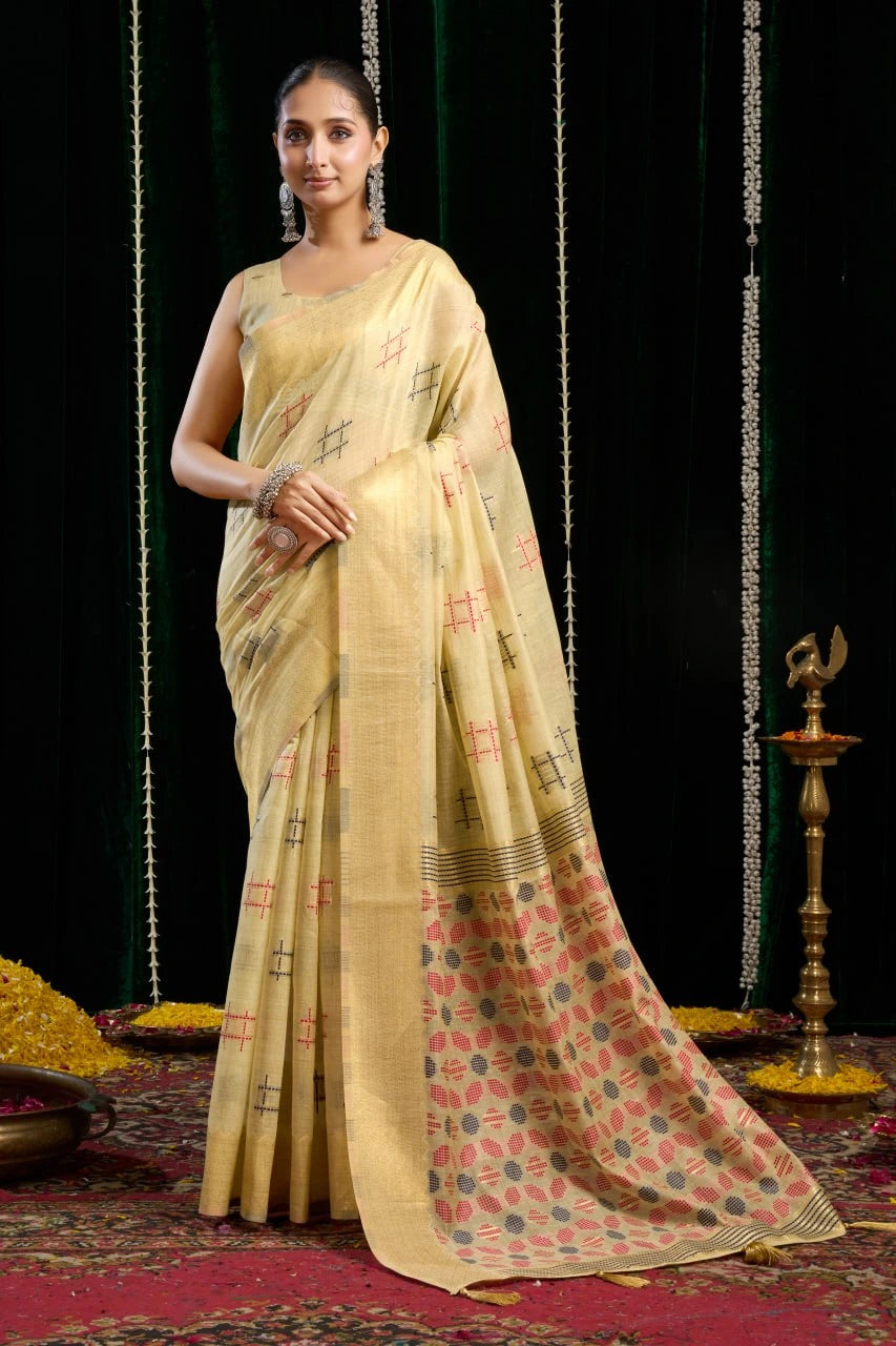 yellow soft spun cotton saree with a silver zari border