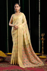 yellow soft spun cotton saree with a silver zari border