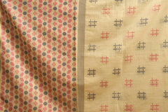 yellow soft spun cotton saree with a silver zari border