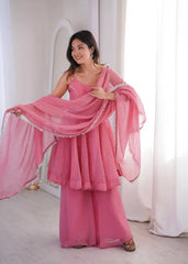 Pink Jharkhand Work Suit KU257 model holding dupatta lace border