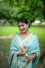 Powder blue fabric with intricate zari work design