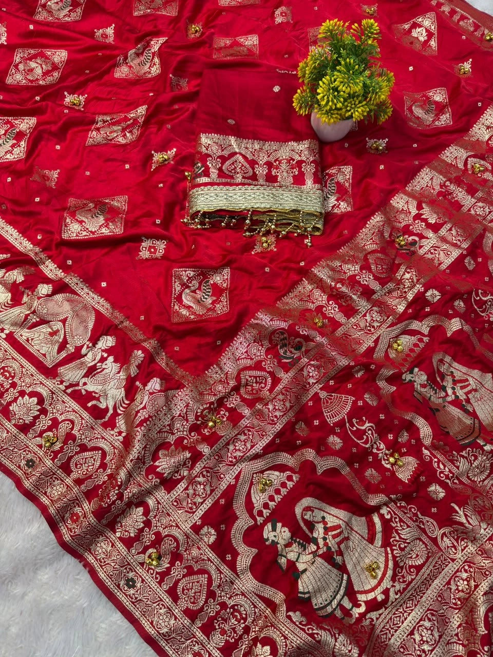 Red Kalyanja saree with running blouse piece