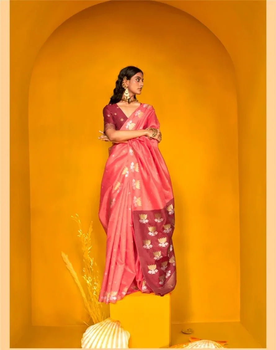 Woman wearing tulip pink khadi silk saree with intricate zari work design standing against a yellow backdrop
Let me know if you want variations for thumbnails, Pinterest, or other platforms.