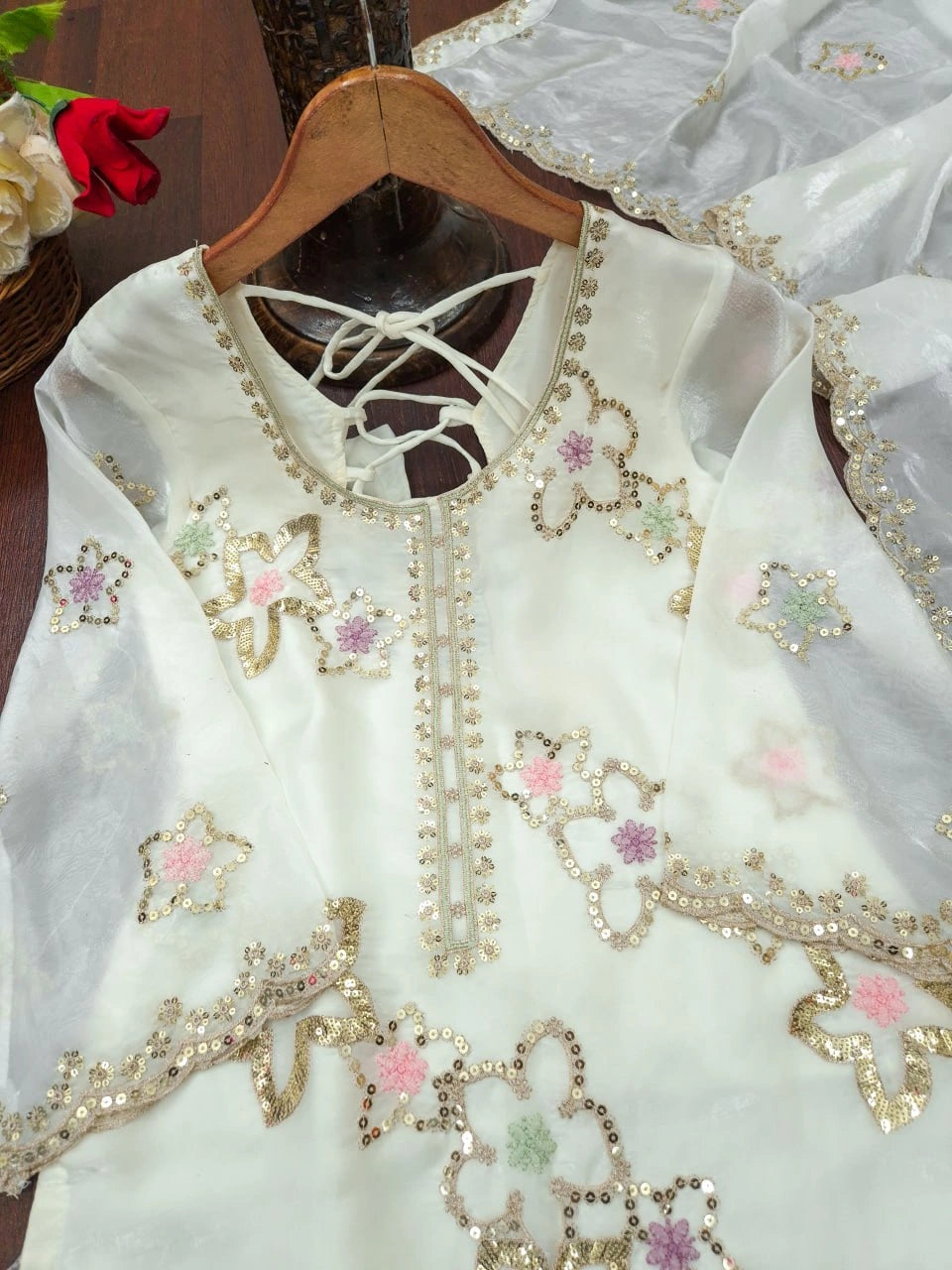 White Sharara Suit flat lay close-up kurta showing multicolor floral sequins embroidery detail
