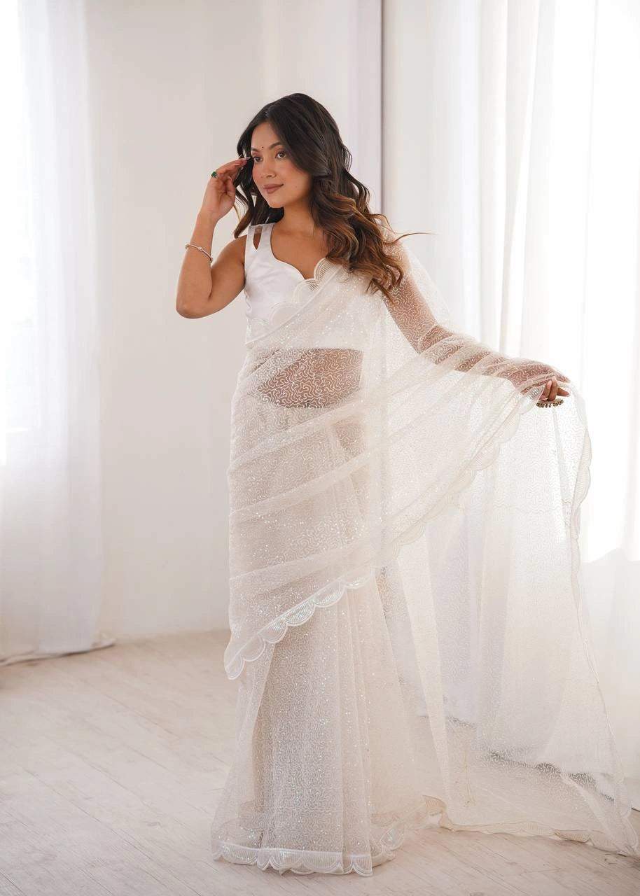 White sequins saree pallu drape – model holding pallu