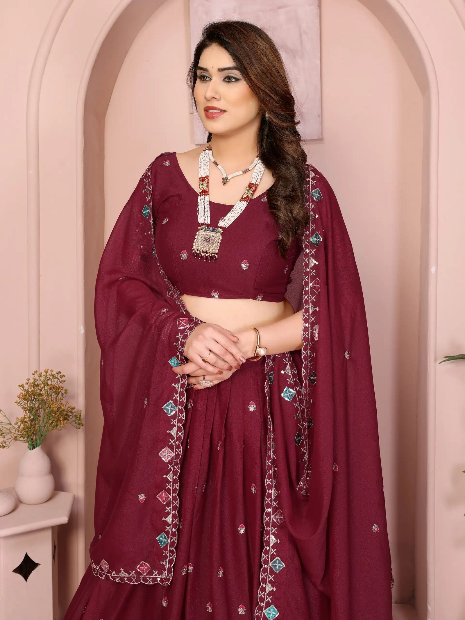 Wine Embroidered Lehenga side pose dupatta flair – Kalyanja KL173